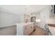 Modern kitchen with stainless steel appliances and an island at 2613 Star Apple Way, Sarasota, FL 34240