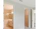 Bright bedroom with ensuite bathroom and walk-in closet at 2613 Star Apple Way, Sarasota, FL 34240