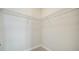 Spacious walk-in closet with wire shelving at 2613 Star Apple Way, Sarasota, FL 34240