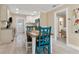 Open concept kitchen with stainless steel appliances and granite countertops at 609 N Osceola Ave, Clearwater, FL 33755