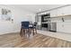 Modern kitchen with stainless steel appliances and white shaker cabinets at 609 N Osceola Ave, Clearwater, FL 33755