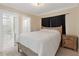 Cozy bedroom with a comfortable bed and built-in closet at 609 N Osceola Ave, Clearwater, FL 33755