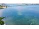 Stunning aerial view showcasing waterfront property and bridge at 609 N Osceola Ave, Clearwater, FL 33755