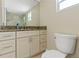 Updated bathroom with granite vanity, new toilet and walk-in shower at 609 N Osceola Ave, Clearwater, FL 33755