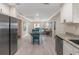 Open concept kitchen with view of living and dining areas at 609 N Osceola Ave, Clearwater, FL 33755