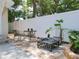 Relaxing backyard patio with fire pit and small seating area at 609 N Osceola Ave, Clearwater, FL 33755