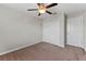 Spacious bedroom with ceiling fan and double door closet at 10549 Lake Montauk Dr, Riverview, FL 33578