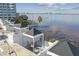 Breathtaking aerial view of a rooftop patio overlooking the bay and the city skyline at 4950 Bayshore Blvd # 23, Tampa, FL 33611