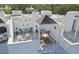 Private rooftop deck with seating, pergola, and lounge chairs at 4950 Bayshore Blvd # 23, Tampa, FL 33611