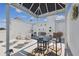 Stylish rooftop patio with a dining area and lounge chairs, perfect for entertaining at 4950 Bayshore Blvd # 23, Tampa, FL 33611
