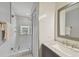 Spa-like shower with patterned tile and glass block window at 4950 Bayshore Blvd # 23, Tampa, FL 33611