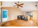 Bright living room with hardwood floors and lots of natural light at 7022 Arbor View Ln, New Port Richey, FL 34653
