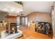 Spacious living room with hardwood floors and a fireplace at 7022 Arbor View Ln, New Port Richey, FL 34653