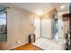 Clean entryway with tiled floors and double doors at 7022 Arbor View Ln, New Port Richey, FL 34653