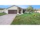 Cozy one-story house with attached garage at 7022 Arbor View Ln, New Port Richey, FL 34653