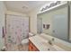 Bathroom with shower/tub, vanity, and toilet at 736 Mccallister Ave, Sun City Center, FL 33573