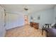 Home office with built-in shelves and a desk at 736 Mccallister Ave, Sun City Center, FL 33573