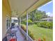 Screened porch overlooking a lush backyard at 736 Mccallister Ave, Sun City Center, FL 33573