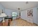 Home office with built-in shelves and a desk at 736 Mccallister Ave, Sun City Center, FL 33573