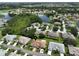 Wide aerial showcasing the home's location within a community at 736 Mccallister Ave, Sun City Center, FL 33573