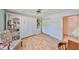 Home office with built-in shelves and a murphy bed at 736 Mccallister Ave, Sun City Center, FL 33573