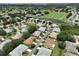 Aerial view of community with lush green spaces and waterways at 736 Mccallister Ave, Sun City Center, FL 33573