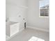 Laundry room with utility sink, shelving and window at 13114 Homestead Ln, Parrish, FL 34219