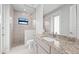 Bathroom with granite countertop and walk-in shower at 5217 Forbes Ter, Port Charlotte, FL 33981