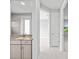 Hallway view leading to rooms featuring modern finishes with neutral color scheme and modern doors at 5217 Forbes Ter, Port Charlotte, FL 33981