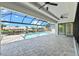 Spacious lanai overlooking the pool and canal at 5217 Forbes Ter, Port Charlotte, FL 33981