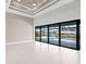 Open floor plan living room with pool view at 5217 Forbes Ter, Port Charlotte, FL 33981