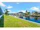 Scenic waterfront property with private dock and lush lawn at 5217 Forbes Ter, Port Charlotte, FL 33981