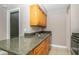 Kitchen with granite countertops and wood cabinets at 210 Red Cedar Pl, Brandon, FL 33510