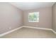 Bright bedroom with neutral walls and new flooring at 210 Red Cedar Pl, Brandon, FL 33510