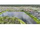 Aerial view of lakefront homes in a community at 12818 Boggy Creek Dr, Riverview, FL 33579