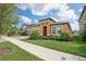 Two-story house with landscaping and driveway at 12818 Boggy Creek Dr, Riverview, FL 33579