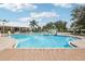 Community pool with water features and ample deck space at 12818 Boggy Creek Dr, Riverview, FL 33579