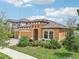 Two-story house with landscaping and driveway at 12818 Boggy Creek Dr, Riverview, FL 33579