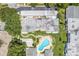 Aerial view showing the community pool and building layout at 1655 S Highland Ave # E223, Clearwater, FL 33756