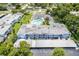 Aerial view of building, parking, and community amenities at 1655 S Highland Ave # E223, Clearwater, FL 33756