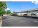 Covered parking area with several cars parked underneath at 1655 S Highland Ave # E223, Clearwater, FL 33756