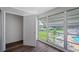 Sunroom with pool and patio views at 1655 S Highland Ave # E223, Clearwater, FL 33756