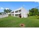 White two-story home with lush lawn at 1655 S Highland Ave # E223, Clearwater, FL 33756