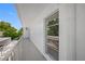 Private balcony with a view of the trees at 1655 S Highland Ave # E223, Clearwater, FL 33756