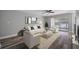 Bright living room with wood-look floors and access to a patio at 1655 S Highland Ave # E223, Clearwater, FL 33756