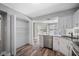 Modern kitchen with stainless steel appliances and granite countertops at 1655 S Highland Ave # E223, Clearwater, FL 33756