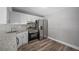 Modern kitchen with stainless steel appliances and granite countertops at 1655 S Highland Ave # E223, Clearwater, FL 33756