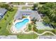 Community pool and shuffleboard area at 1655 S Highland Ave # E223, Clearwater, FL 33756