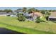 Aerial view showcasing home's location on lake at 11314 Misty Isle Ln, Riverview, FL 33579