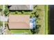 Aerial view of house and pool at 11314 Misty Isle Ln, Riverview, FL 33579